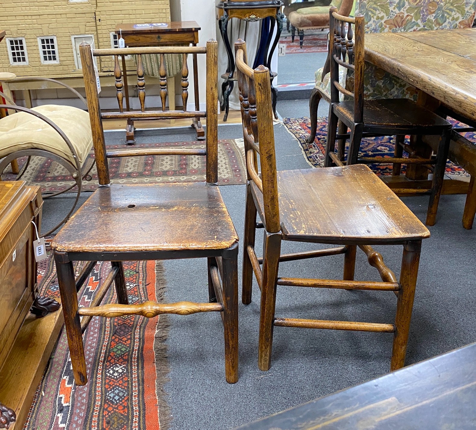 A set of six early 19th century provincial ash and elm wood seat dining chairs